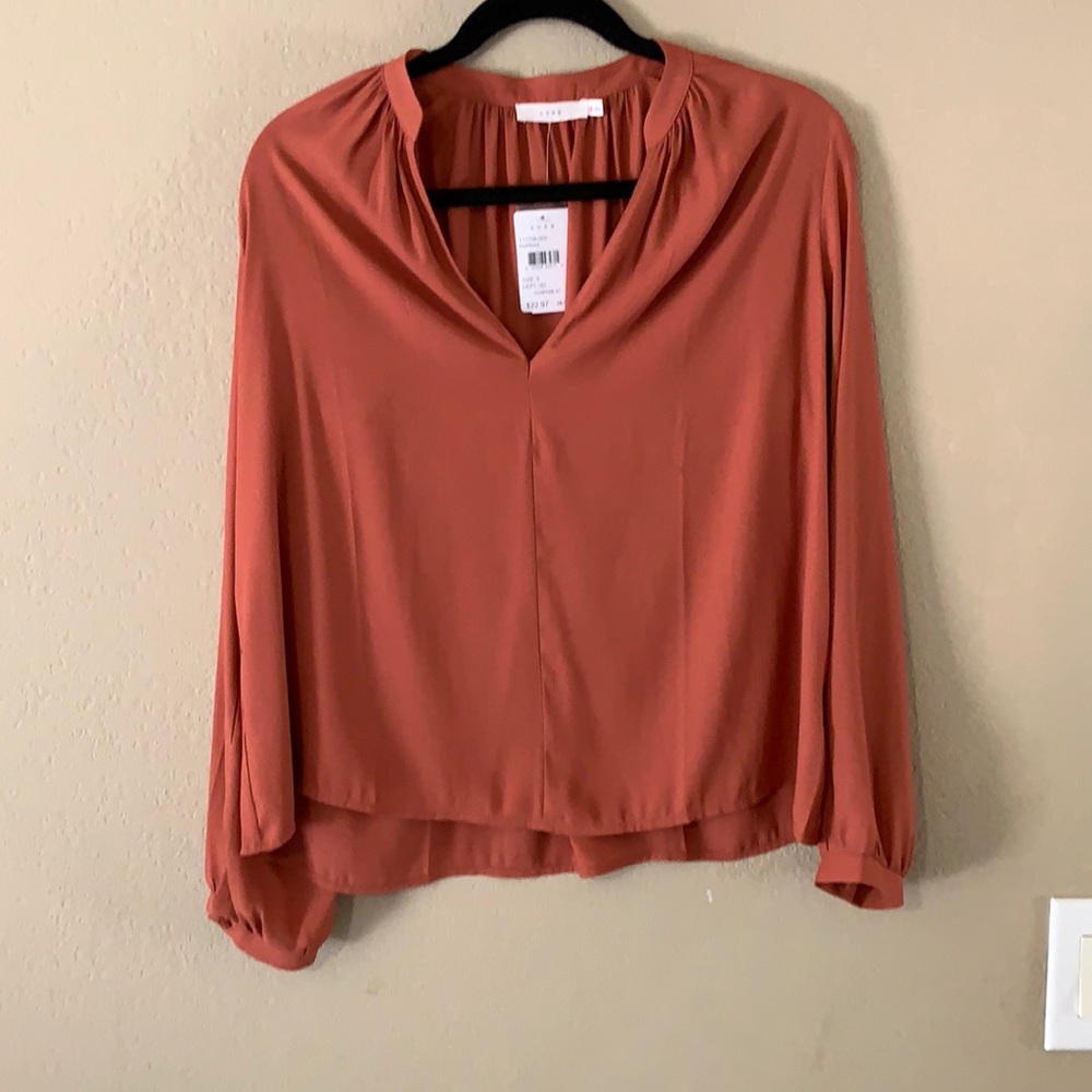Orange lush long sleeve top